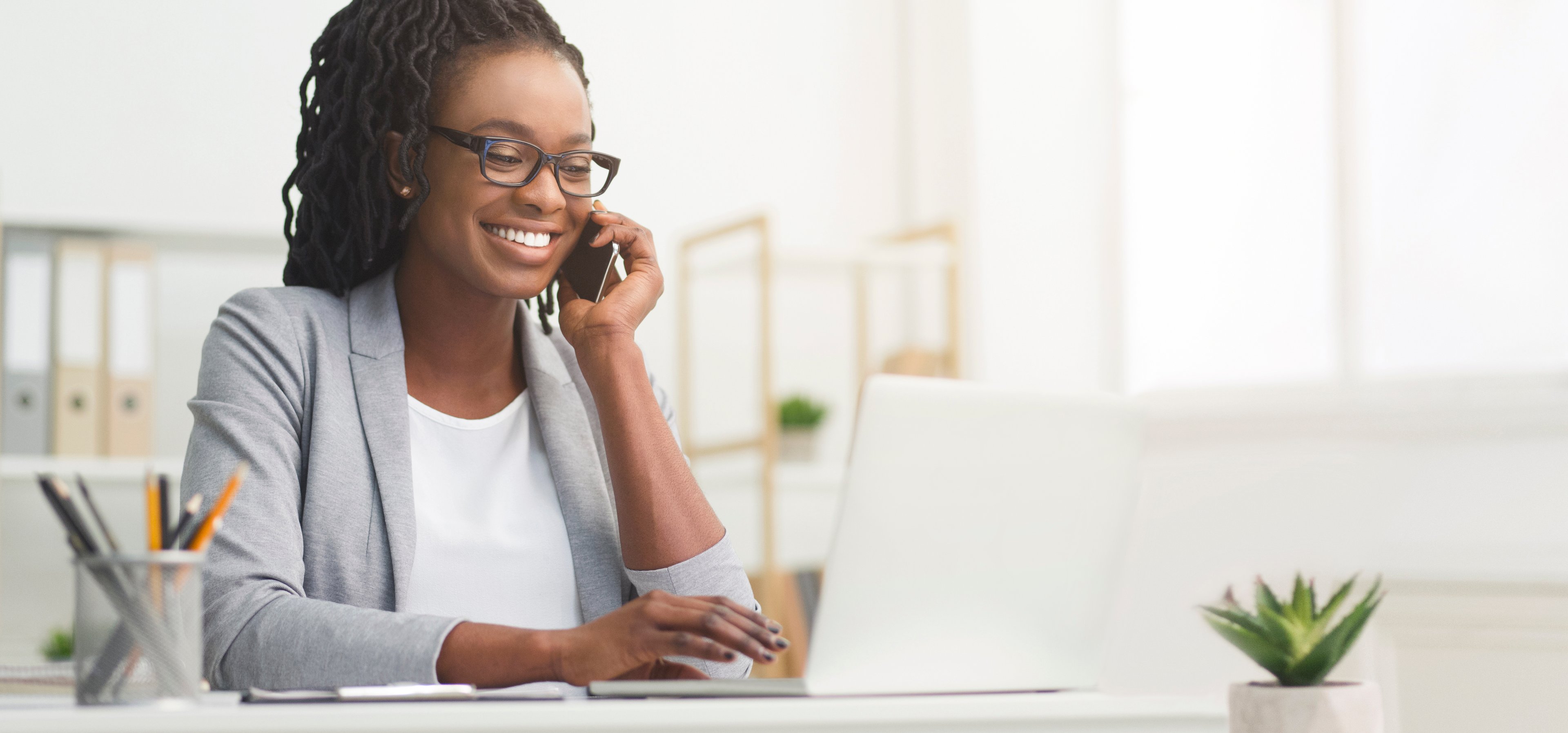 woman phone call talk laptop business office