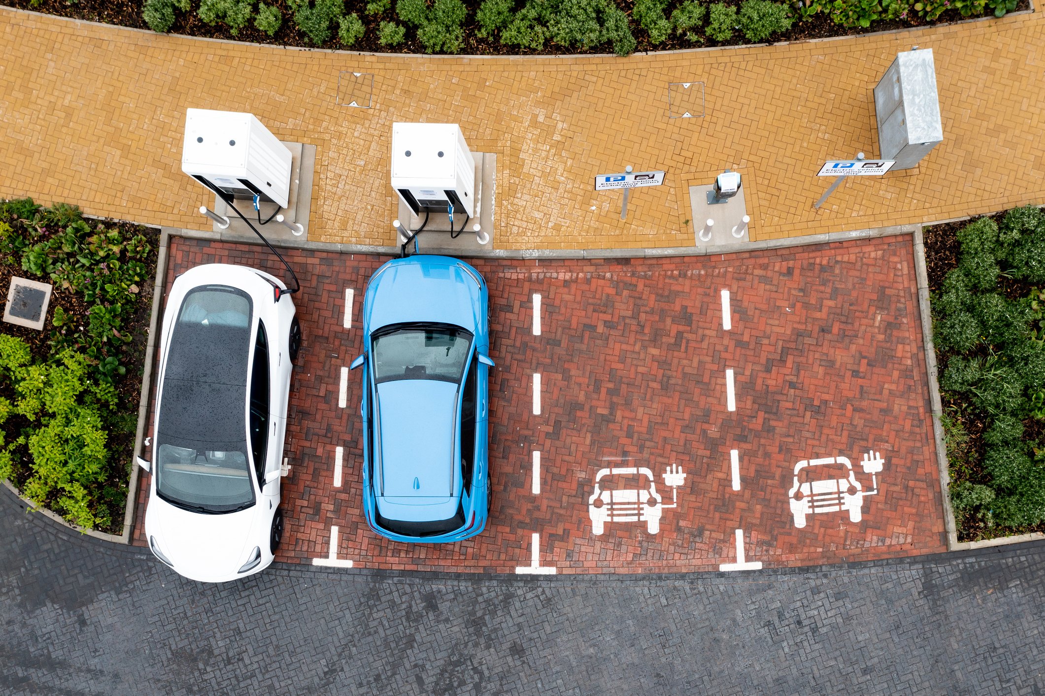electric cars at EV charging stations