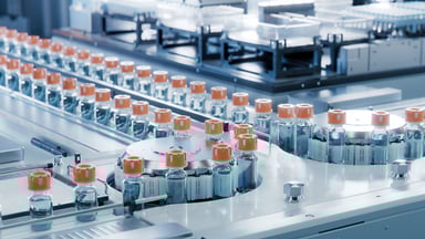 vaccine bottles being manufactured