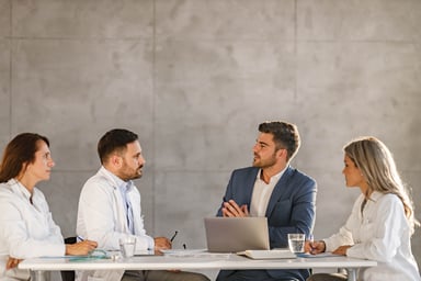 group of doctors talking on a meeting in hospital