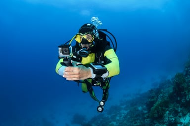 scuba diver go pro ocean exploration