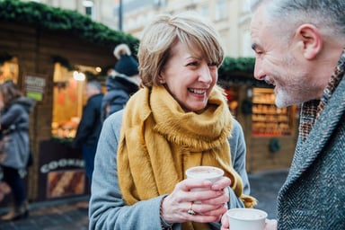 People holding cups of coffee