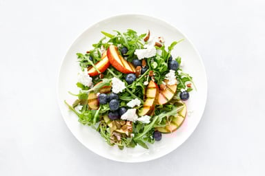 salad with fruits cheese greens
