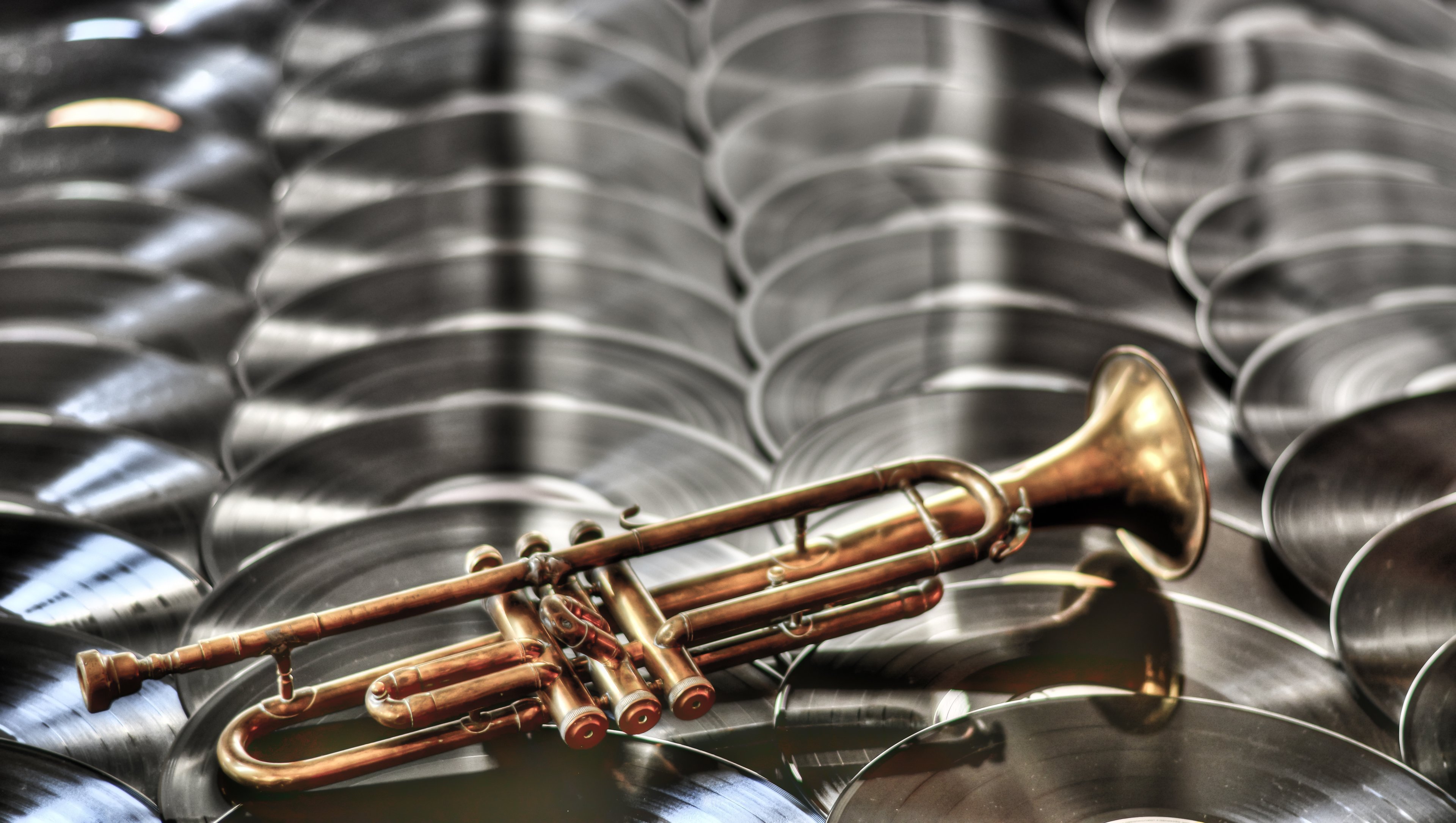A trumpet and some vinyl records.