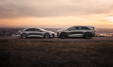 Lucid Air and Gravity SUV at sunset