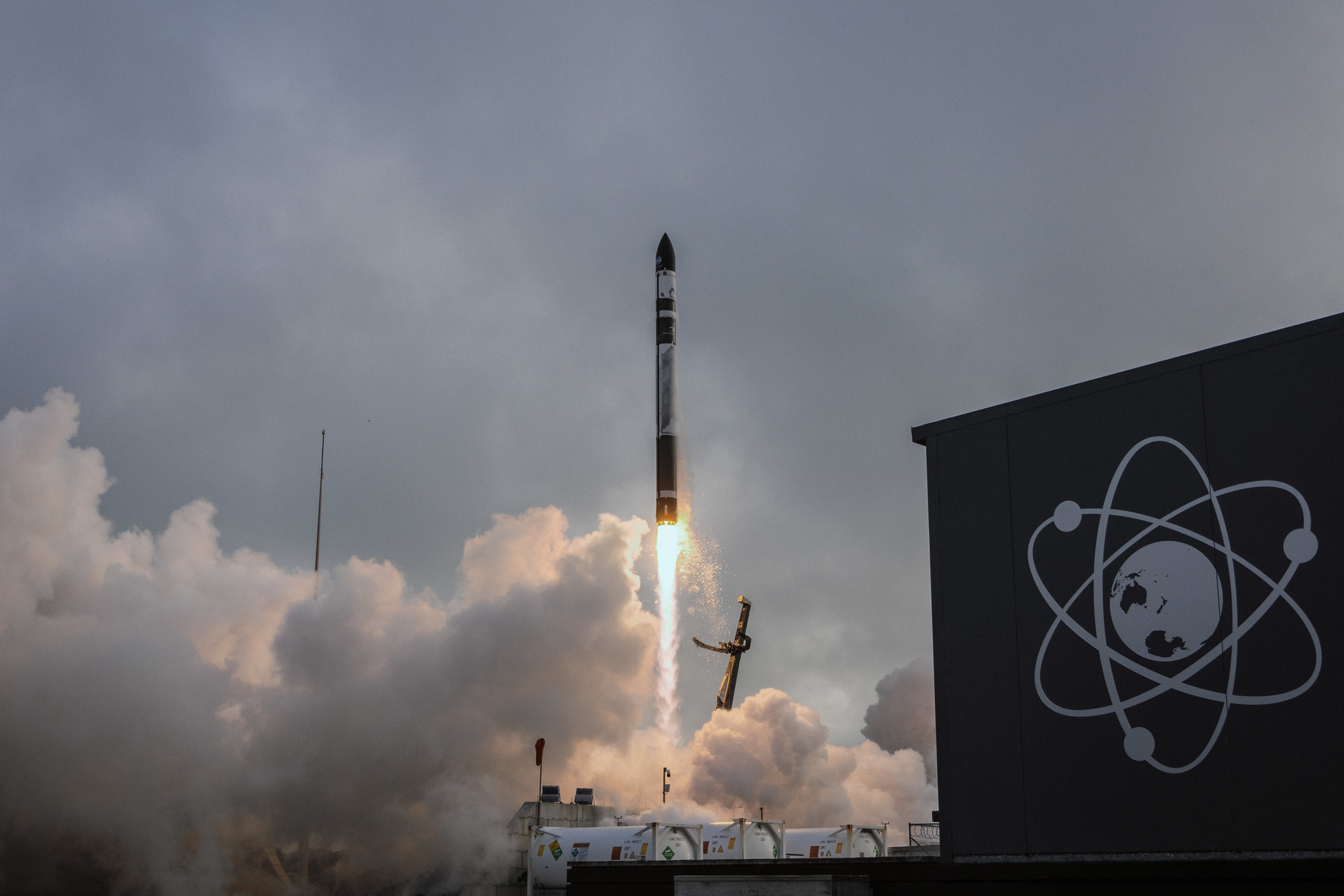 Rocket Lab's Electron rocket taking off from its launch complex.