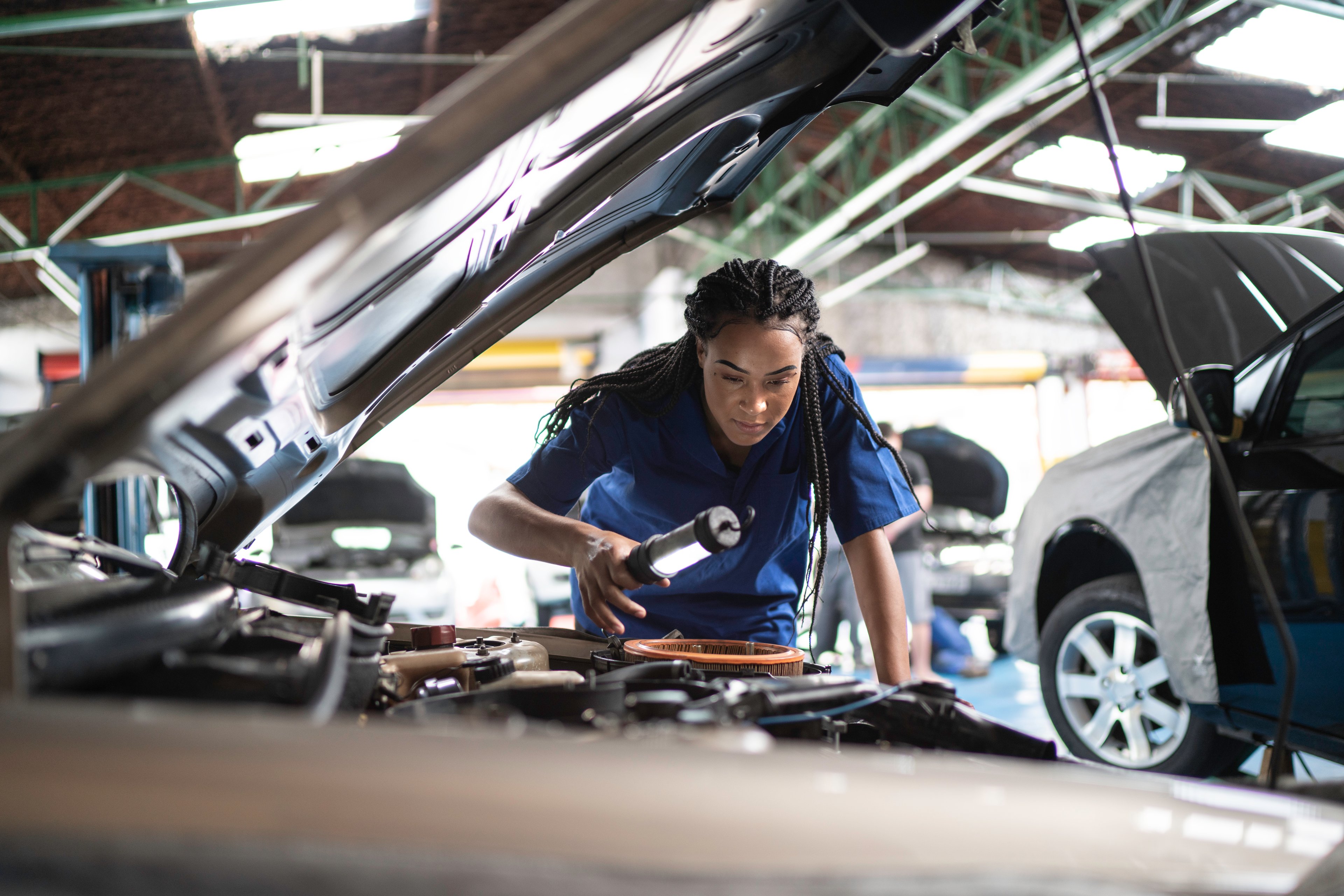 female mechanic auto car fix oil change broken (2)