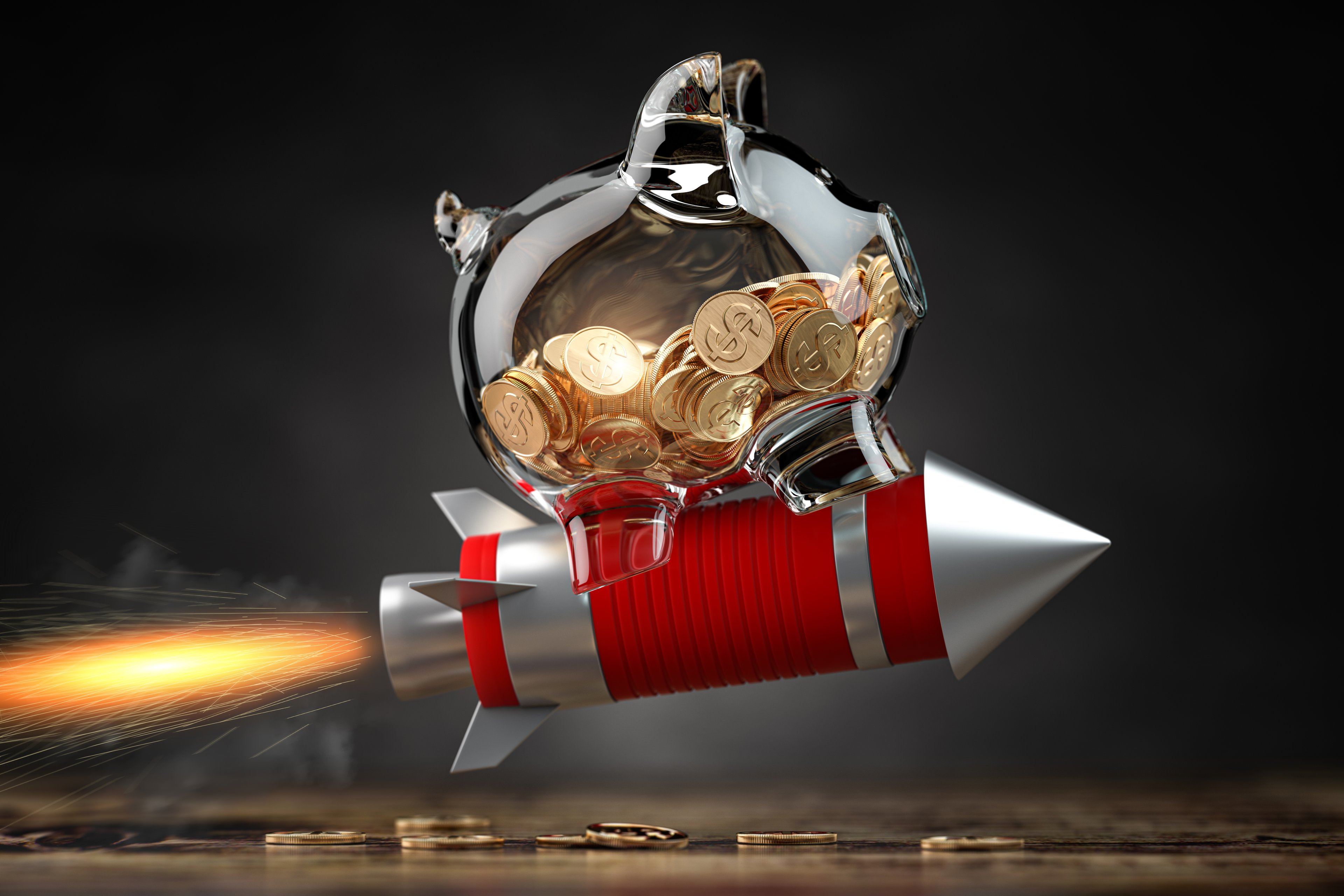 Rocket ship graphic with piggy bank on top