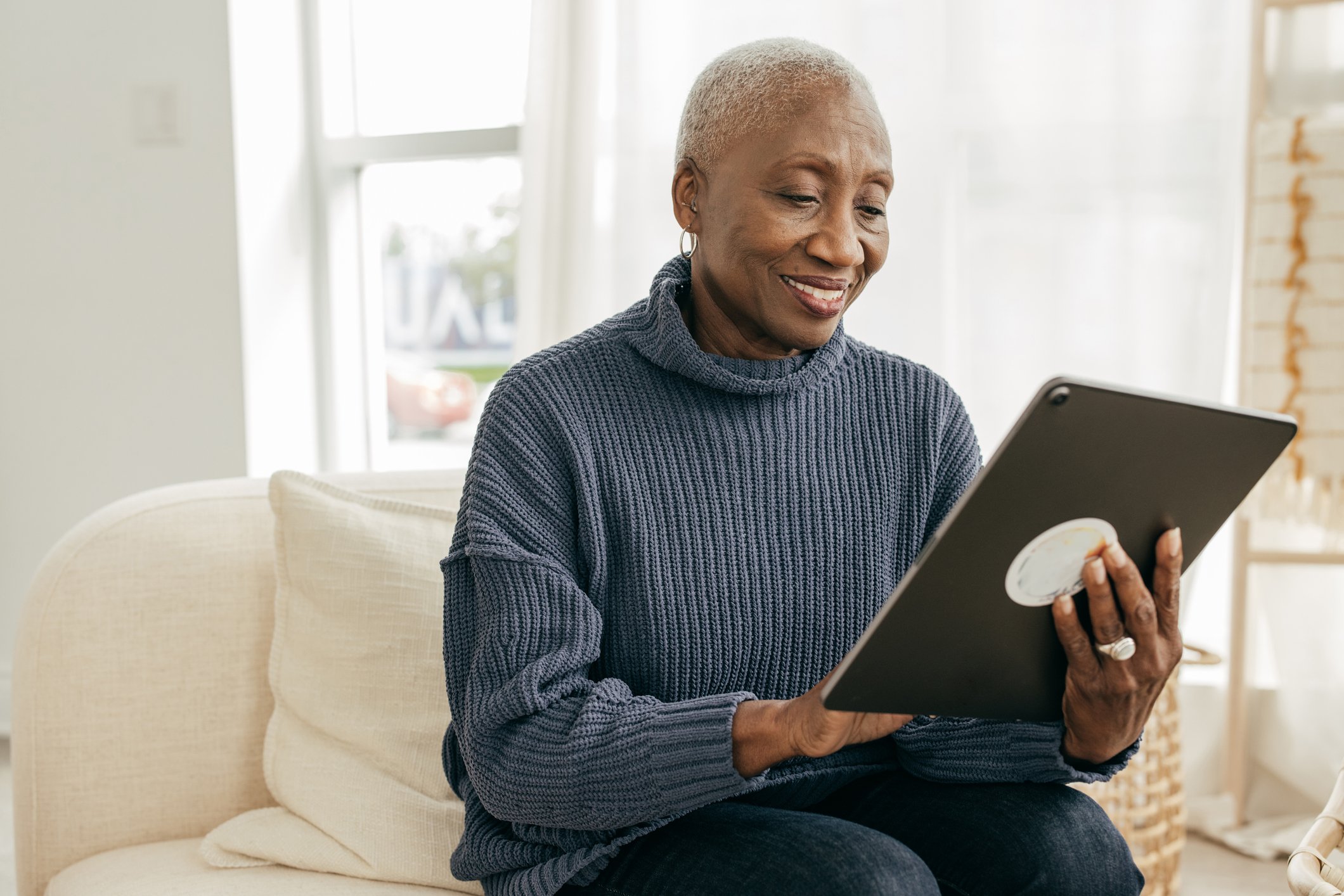 senior social security home banking tablet