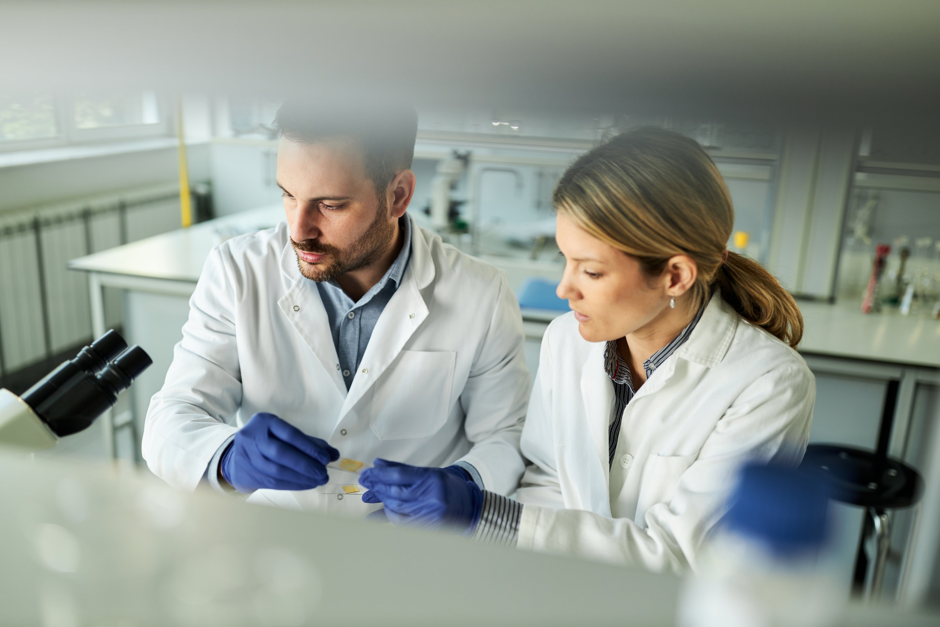 scientists doing research in lab