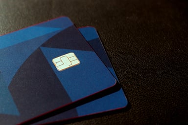 Two blue stacked credit cards.
