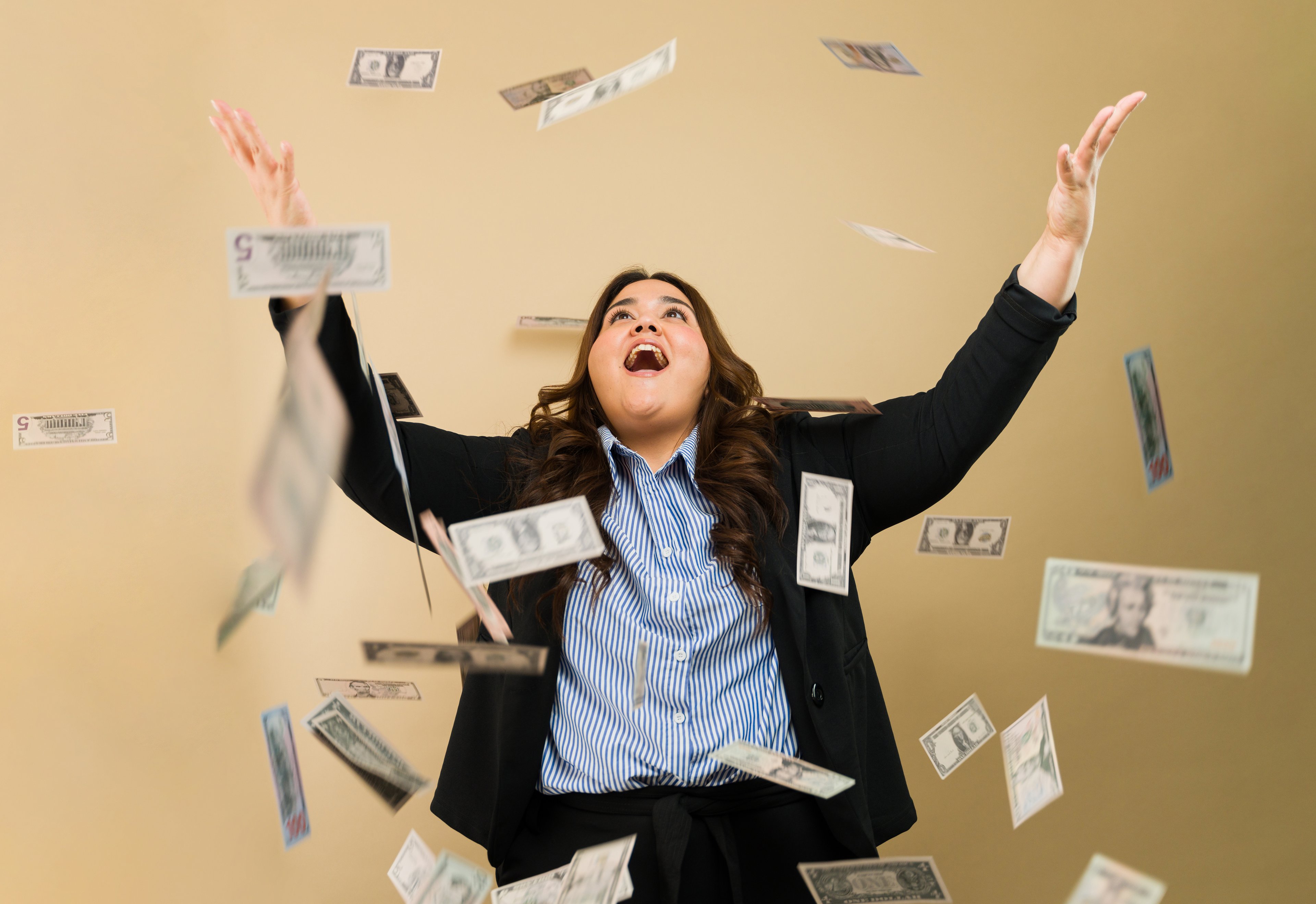 Happy investor raining cash