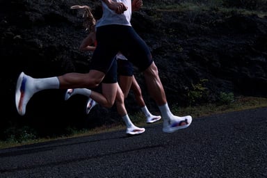 People running wearing On sneakers