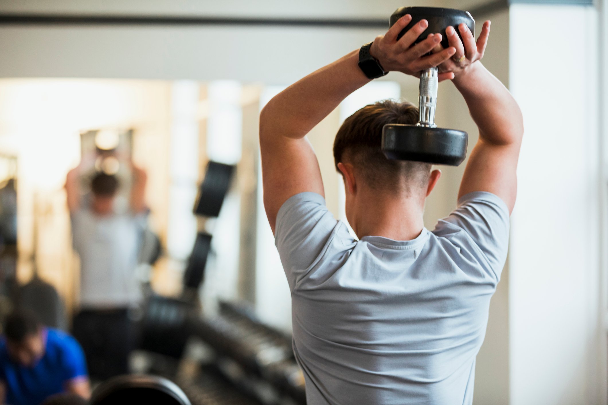 lifting weights at gym