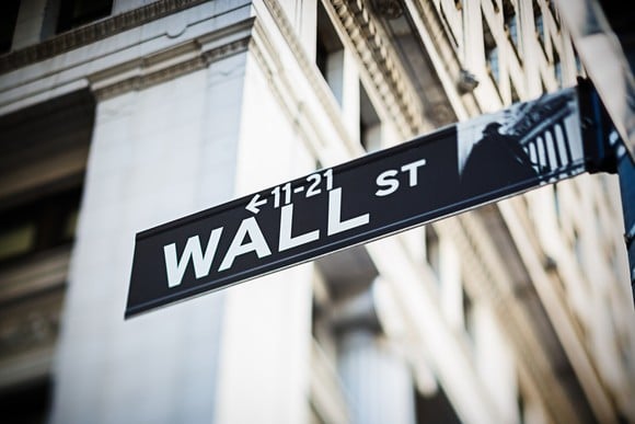 The "Wall St." street sign outside of the New York Stock Exchange.
