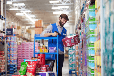 Walmart associate scanning an item