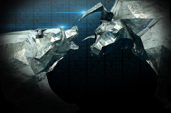 A stylized bull and bear fighting.