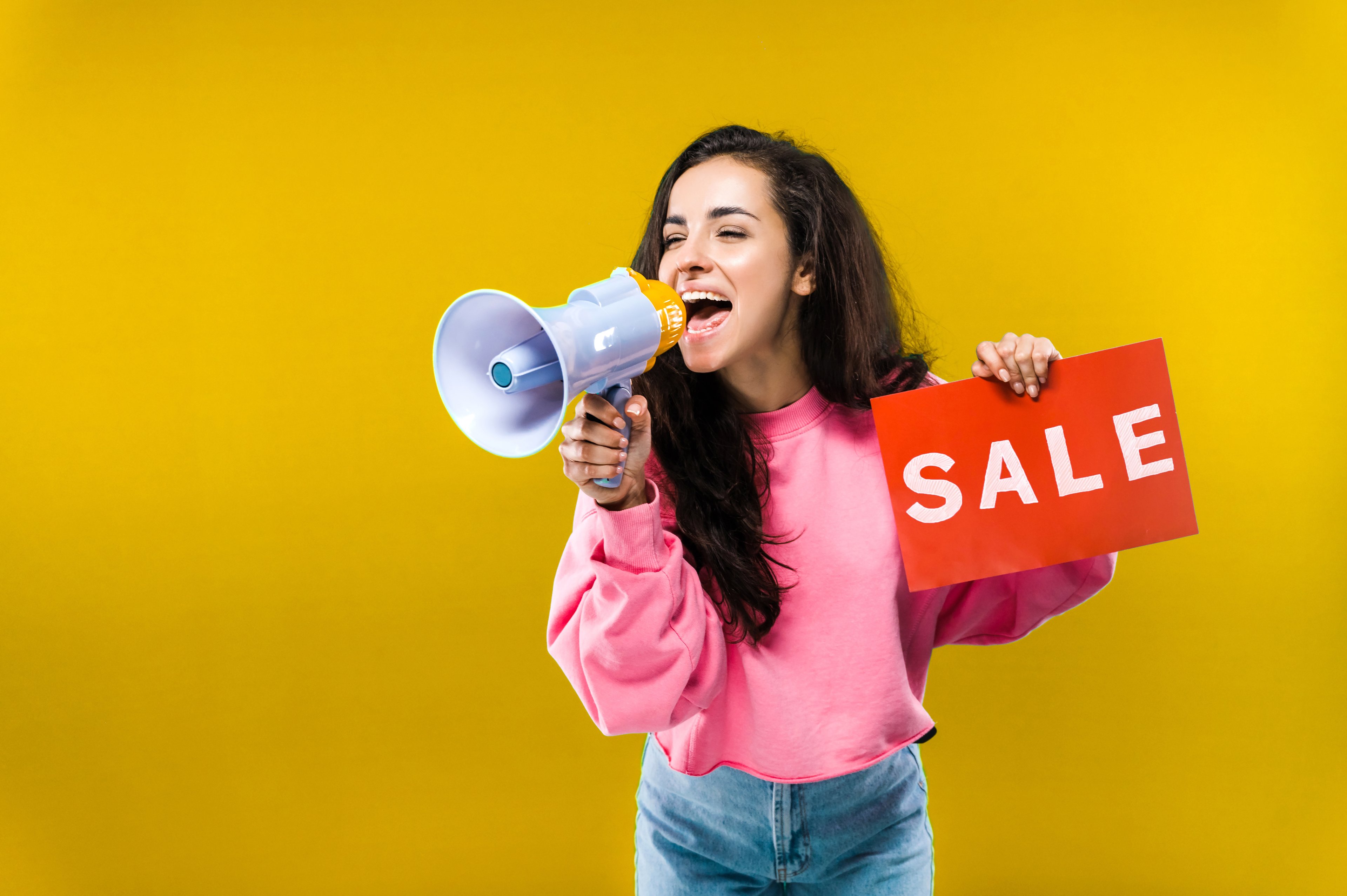 Sale sign woman holding megaphone