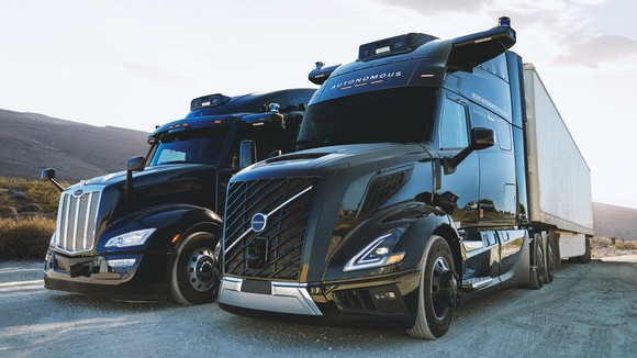 Two semi trucks equipped with Aurora's self-driving sensor hardware. 