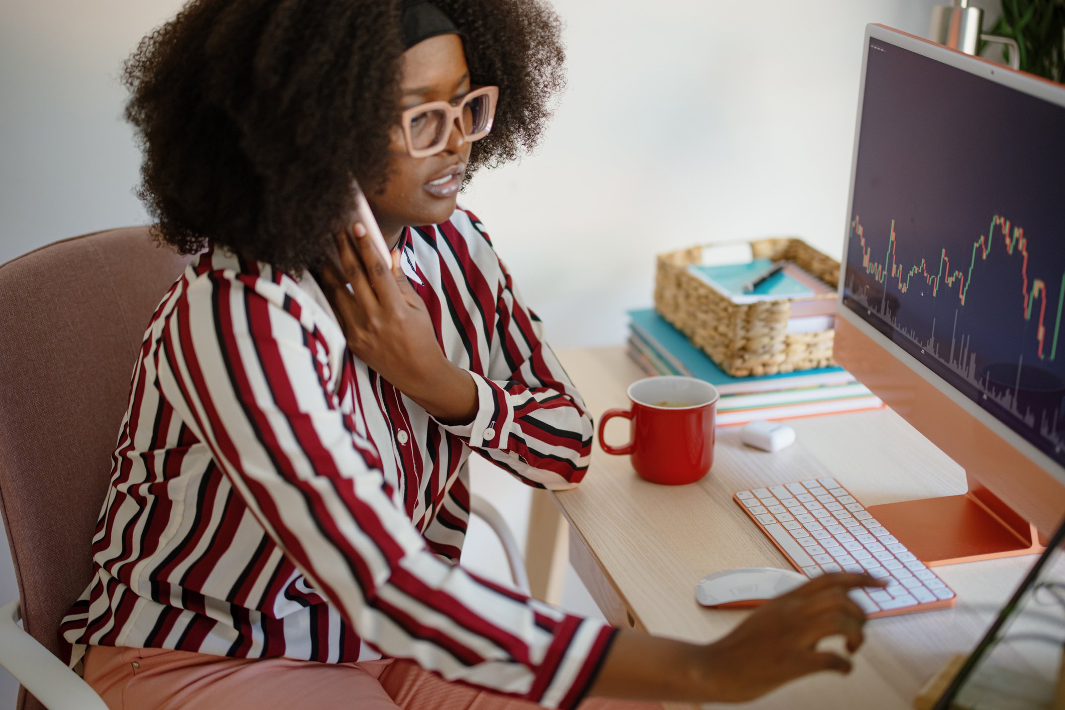 woman looks at cryptocurrency prices getty 2022
