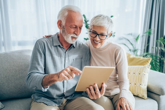 Older couple looking at papers.