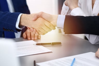 business people shaking hands