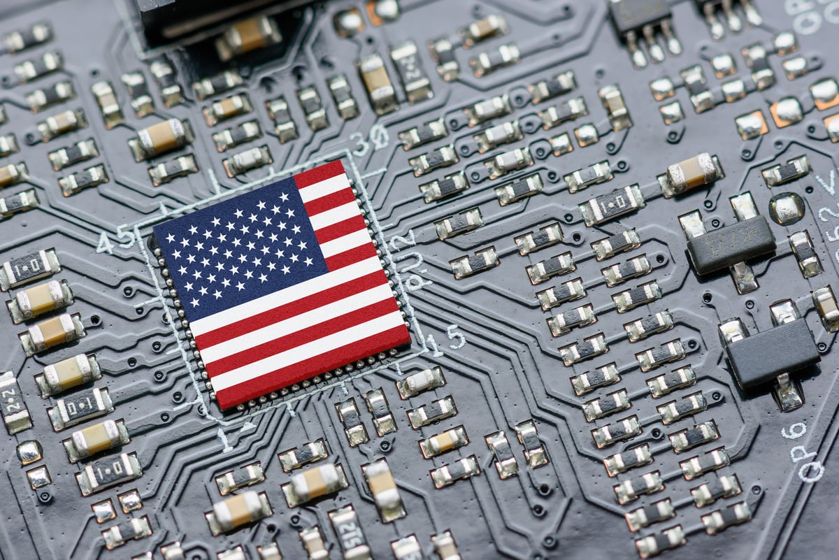 The image of an American flag is shown on a computer chip.
