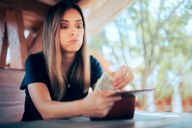 nervous consumer with wallet