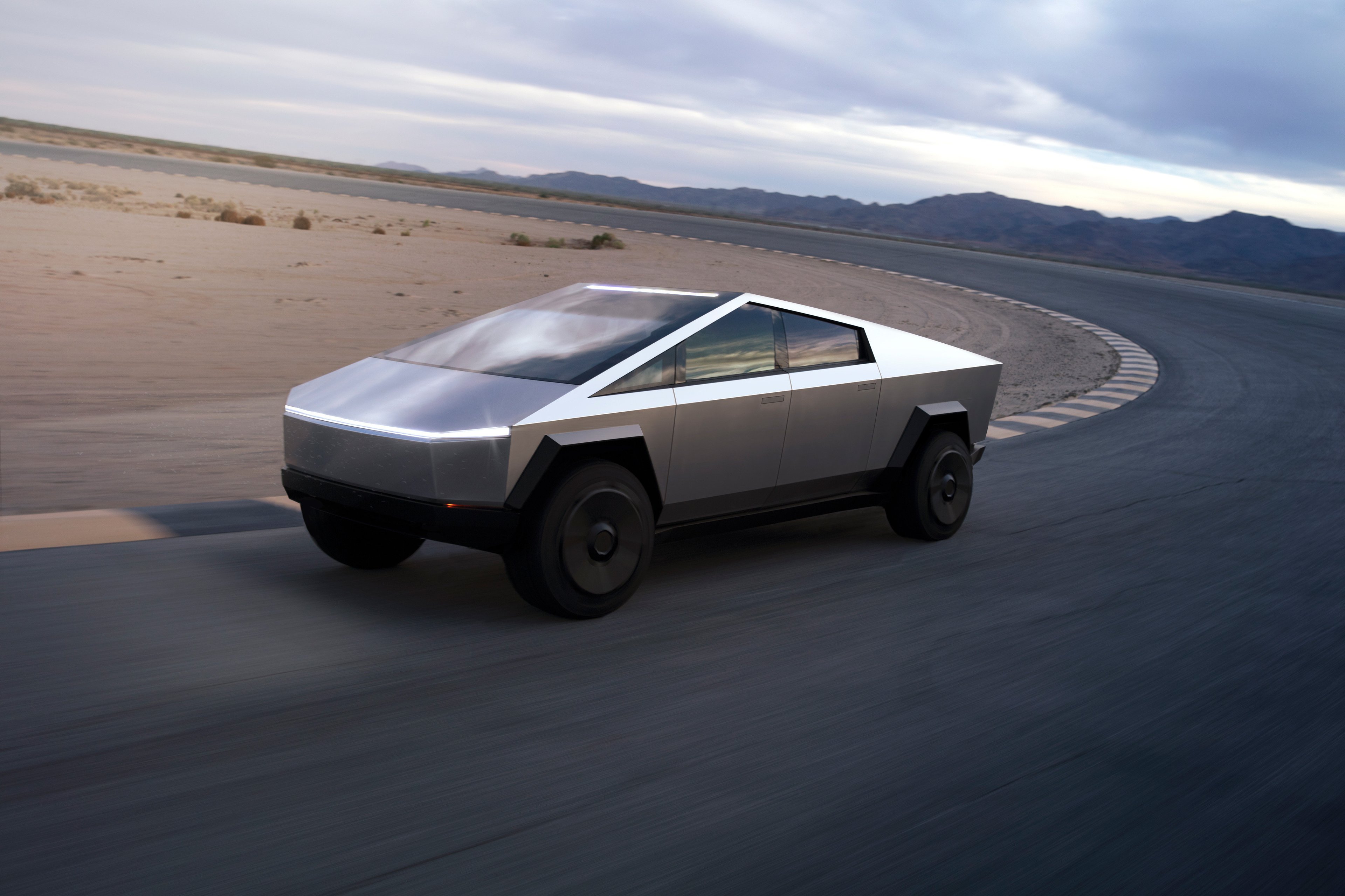 A Tesla Cybertruck on a track.
