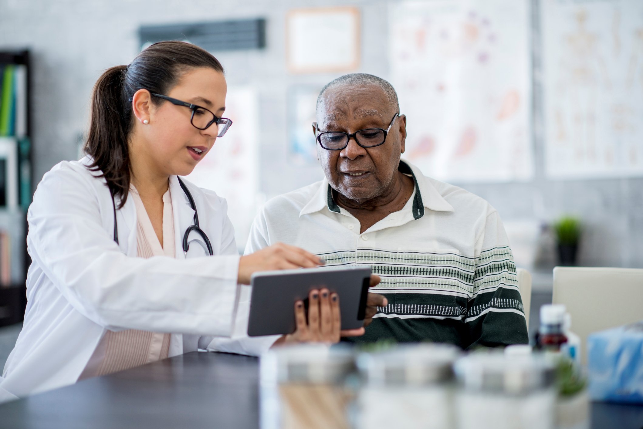 Doctor going over results with a patient.