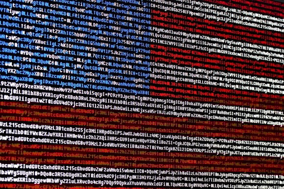 American flag with red, white, and blue computer code.