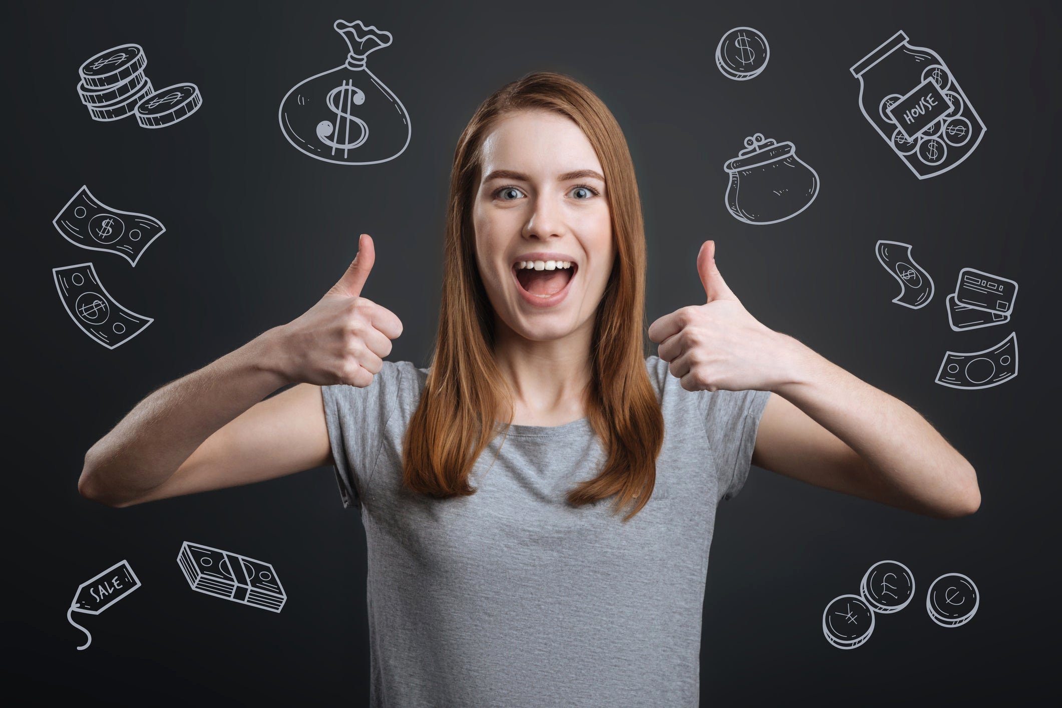 smiling person holding thumbs up