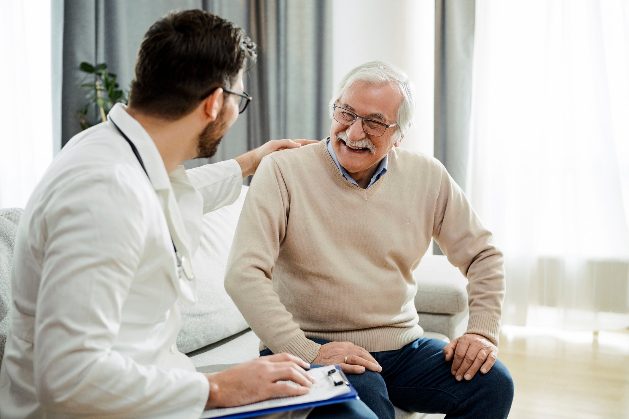 Patient talking with a physician.