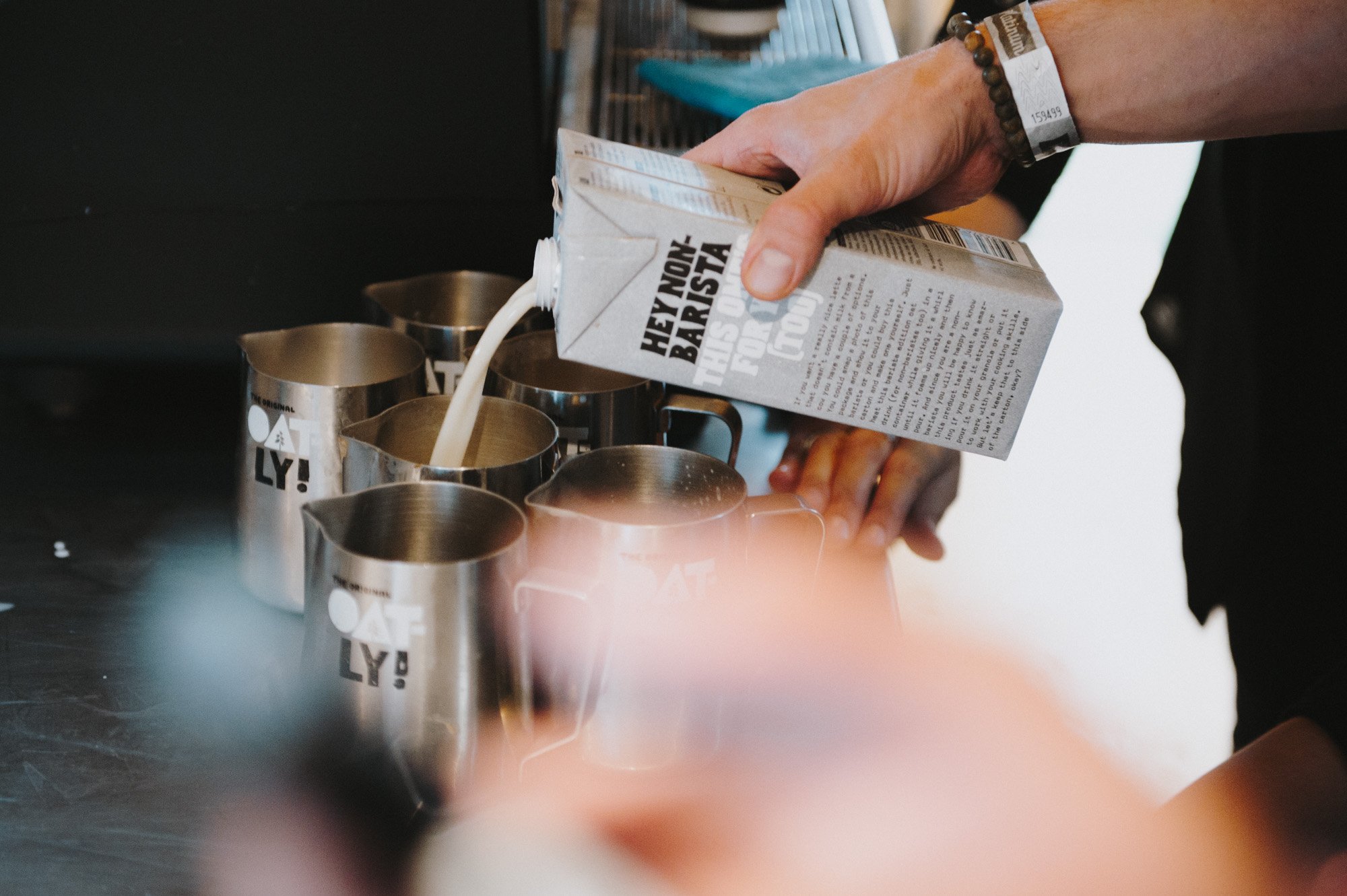 Oatly pouring