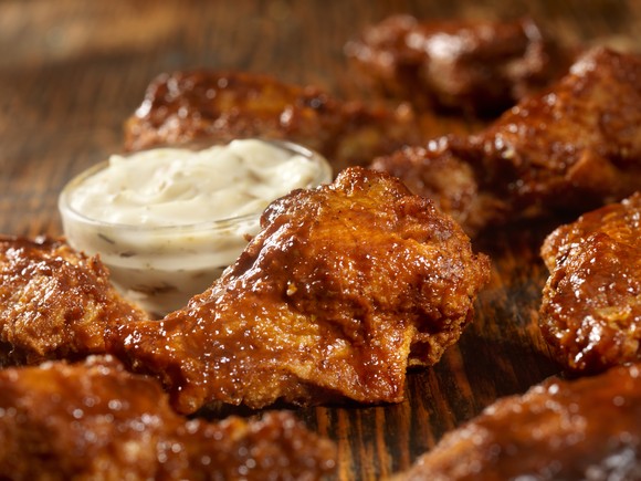 Fried chicken wings with dip.