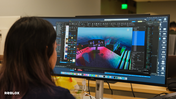 A student uses Roblox to create a game.