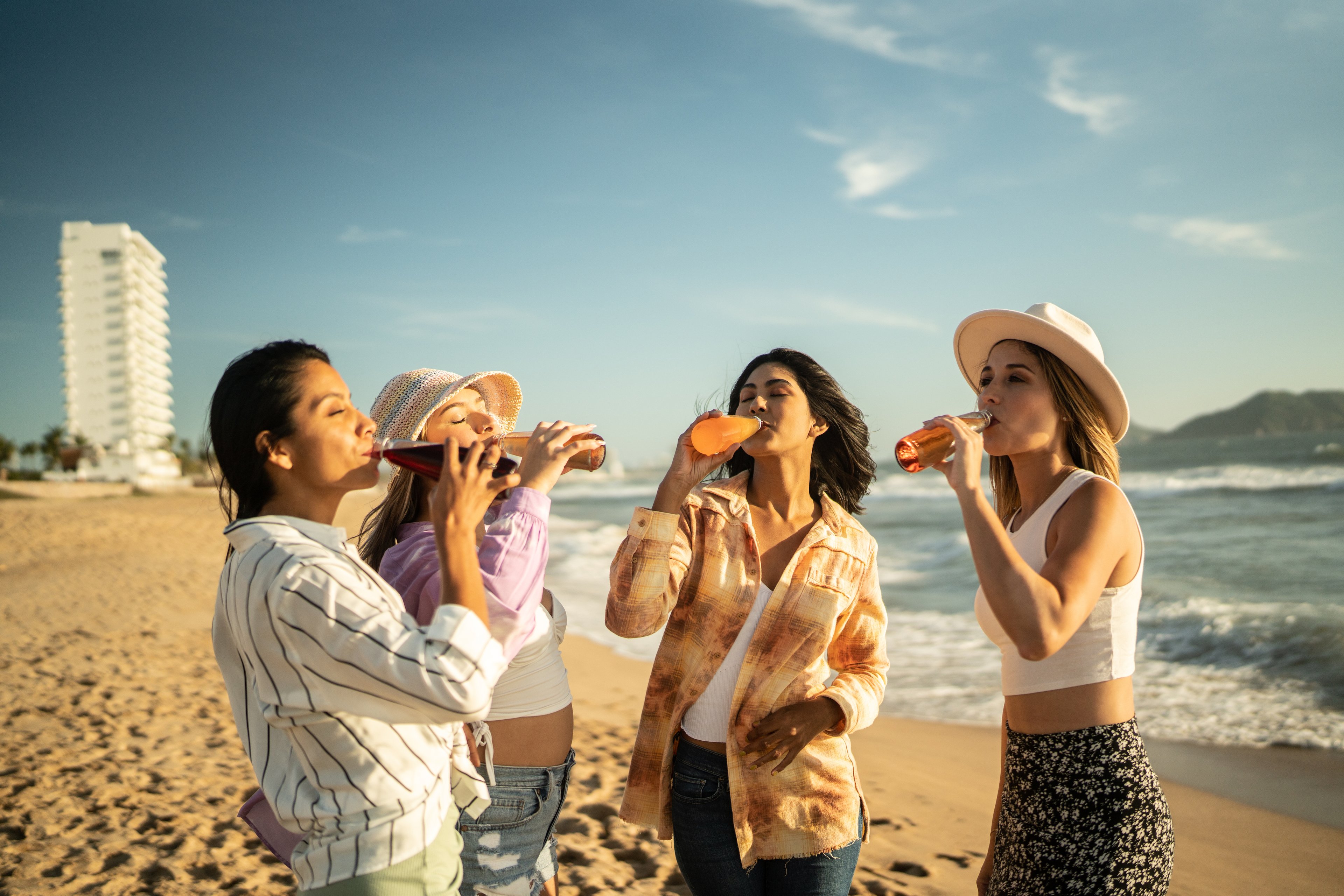 cruise vacation group drinking on beach
