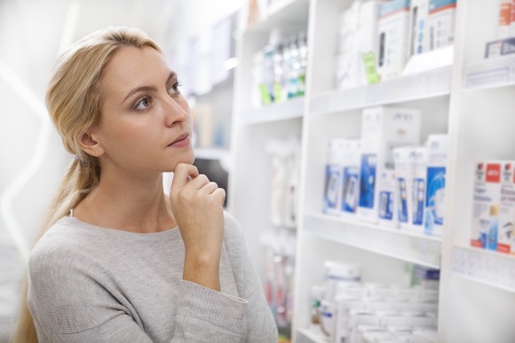 A person shopping in a pharmacy.