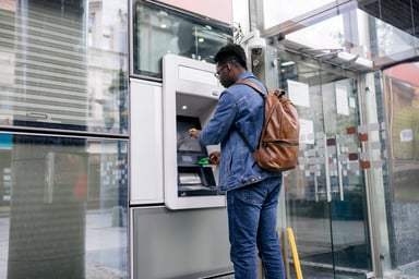 person uses atm getty