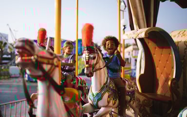 Kids on a merry-go-round.