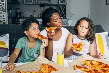 family eating pizza