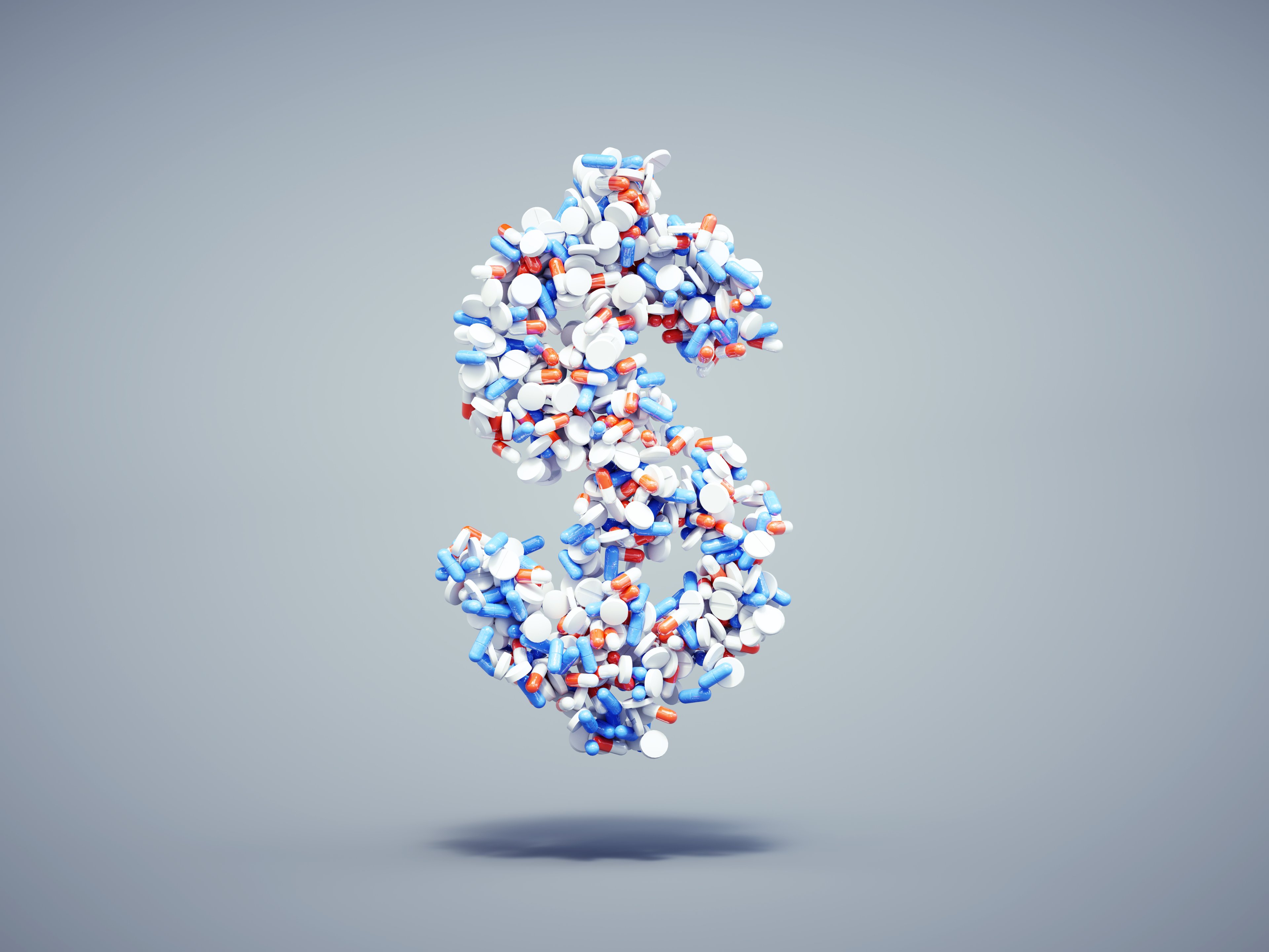 A dollar sign made up of multi-colored pills.