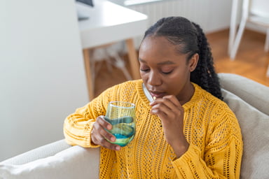 Patient taking medicine.