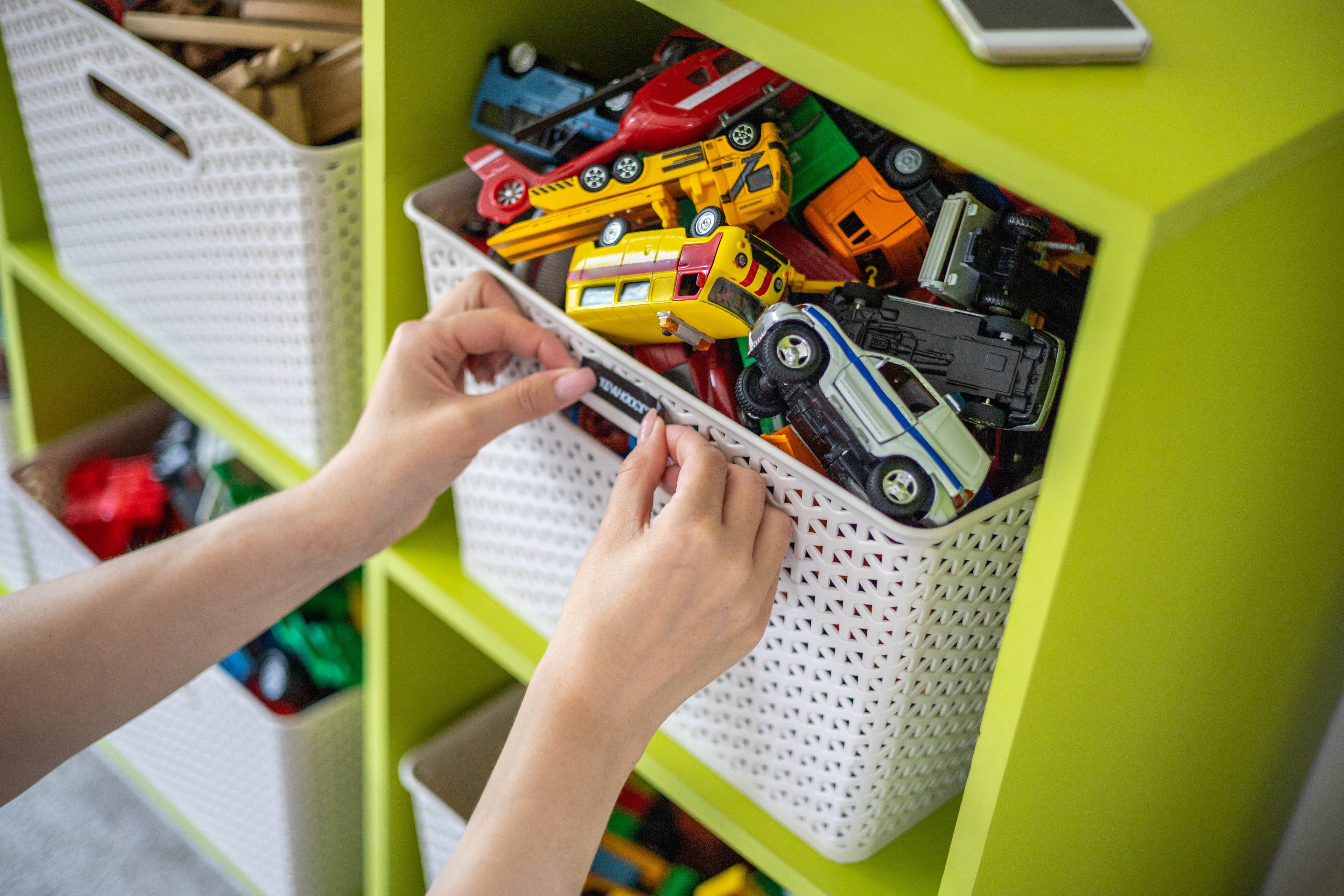 kid pulling out toys, mattel, hasbro