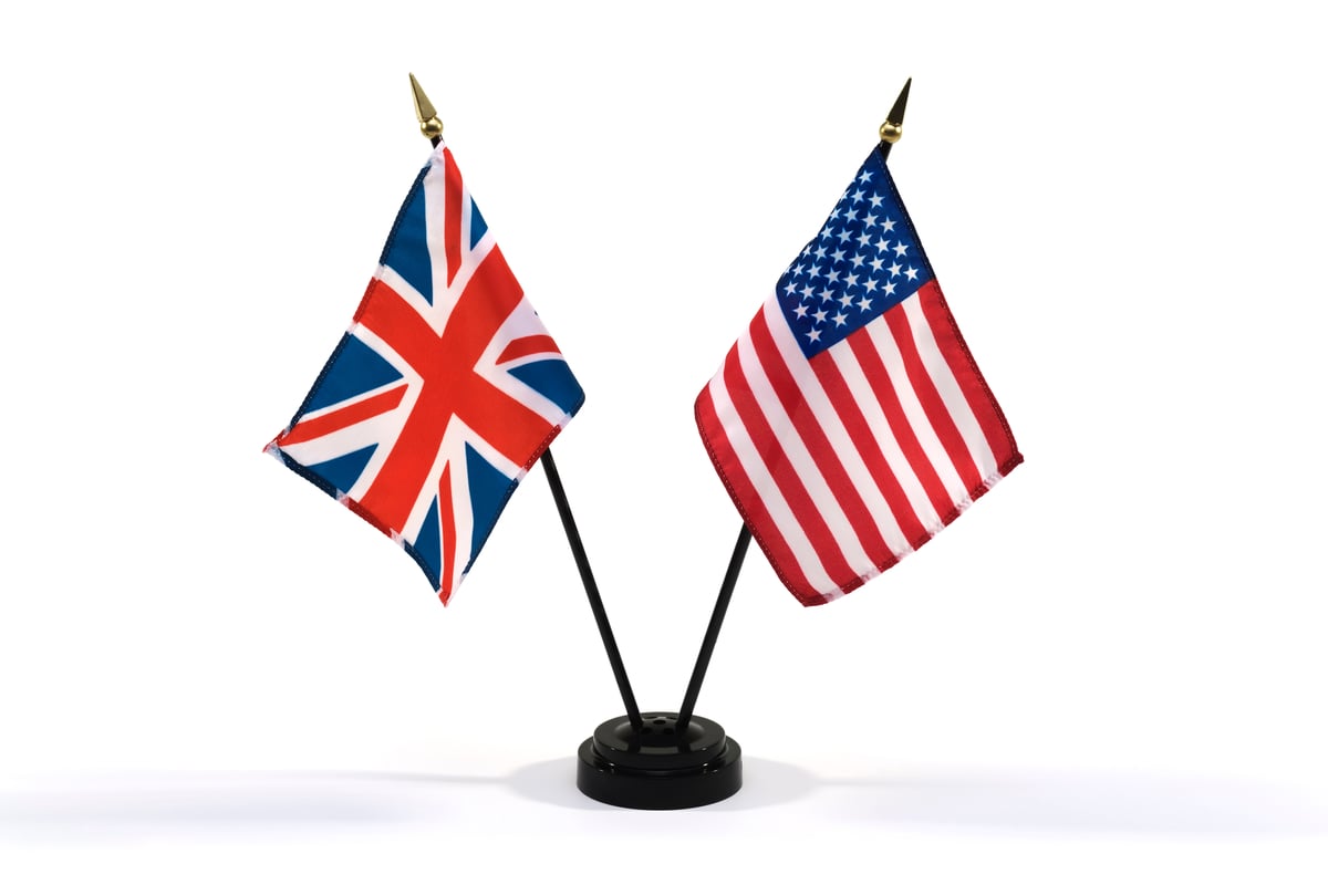 The US and UK flags on a white background.