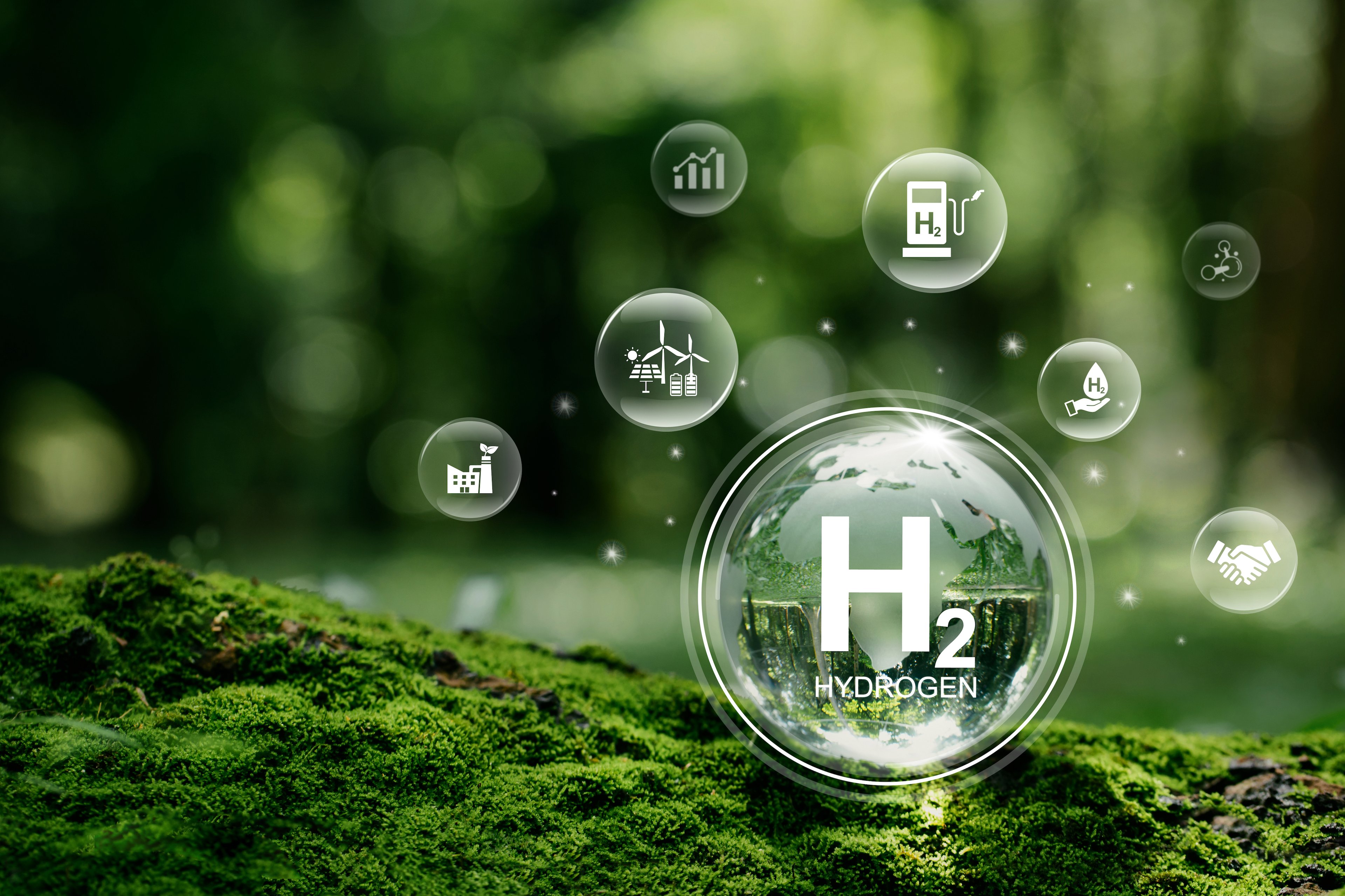 Hydrogen symbol H2 in bubbles, indicating green energy.