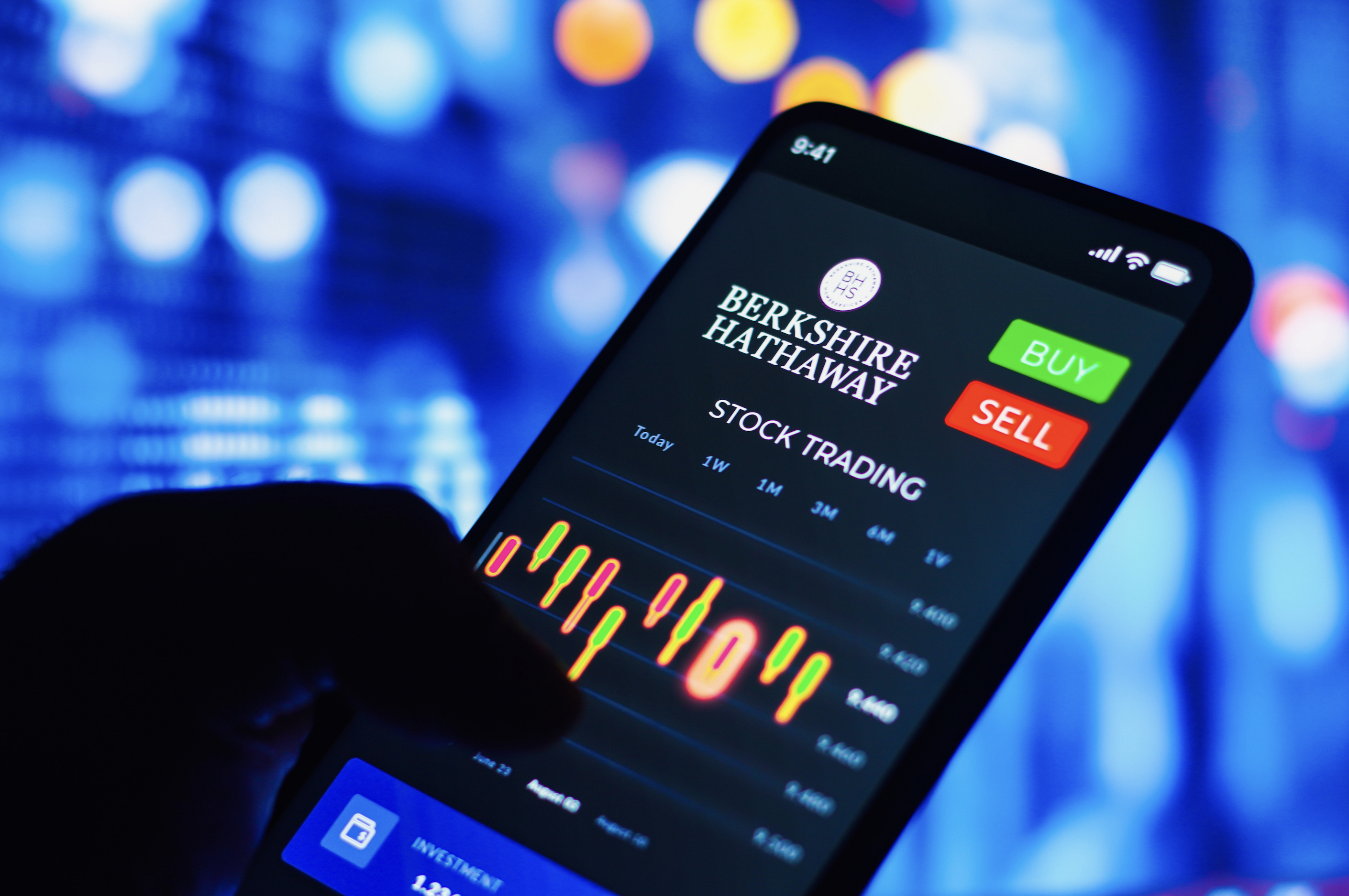 Berkshire Hathaway's logo displayed on a stock-trading, phone app.