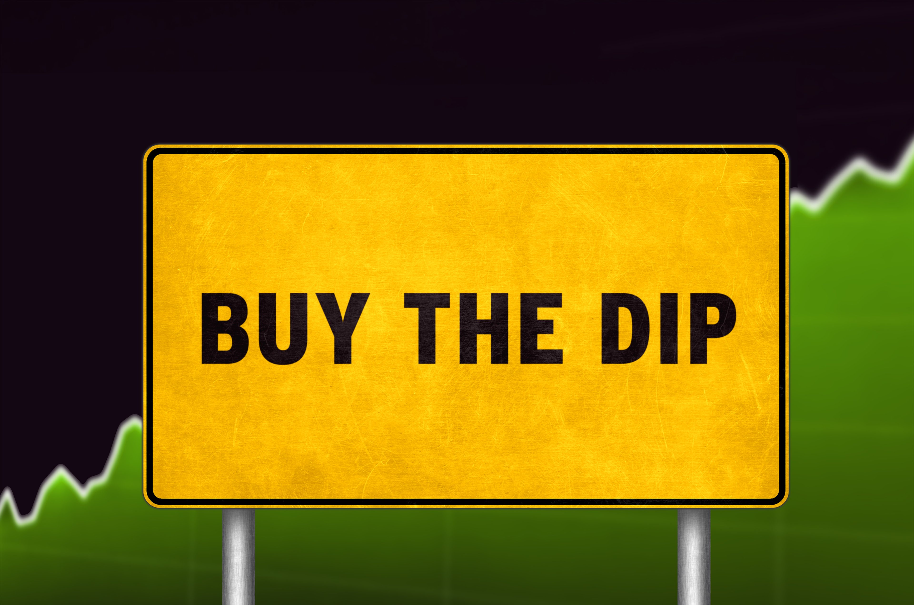 A sign that reads "Buy The Dip."