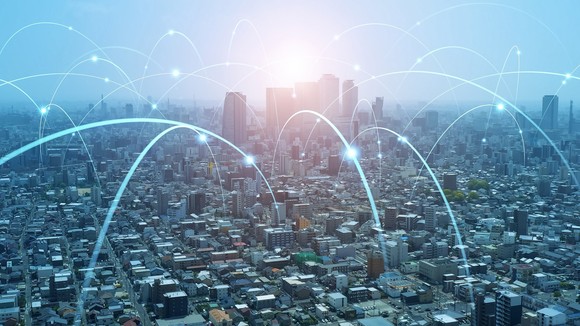 A city with blue arcs.