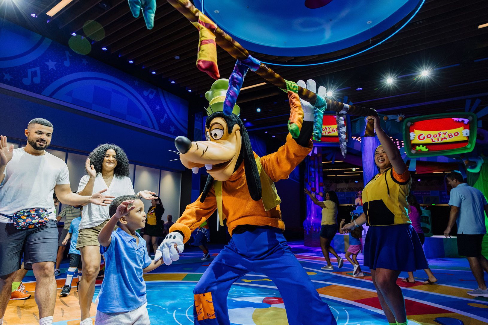 Goofy leads a dance party with games at Epcot this summer.